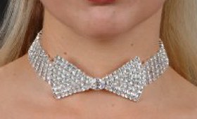 Bow Tie Choker Rhinestone choker with bow tie shaped front. Choker has 5 rhinestone rows.